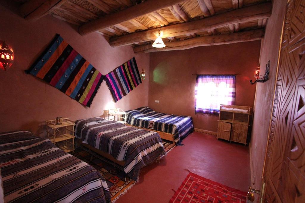 Maison D'Hotes Agdal Telouet Tiguidert Habitación foto